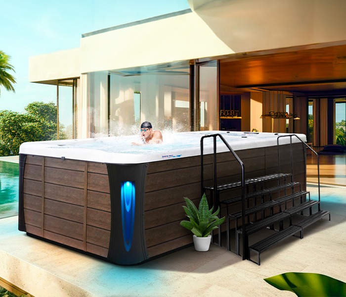 Calspas hot tub being used in a family setting - Seville